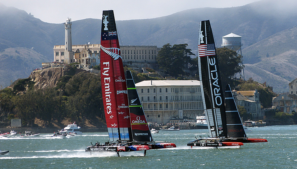 Oracle USA and Emirates Team New Zealand racing past Alcatraz
